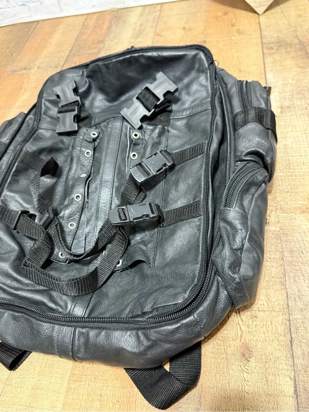 Heavy Duty Black Leather Motorcycle Backpack  Pre owned good condition.. there i